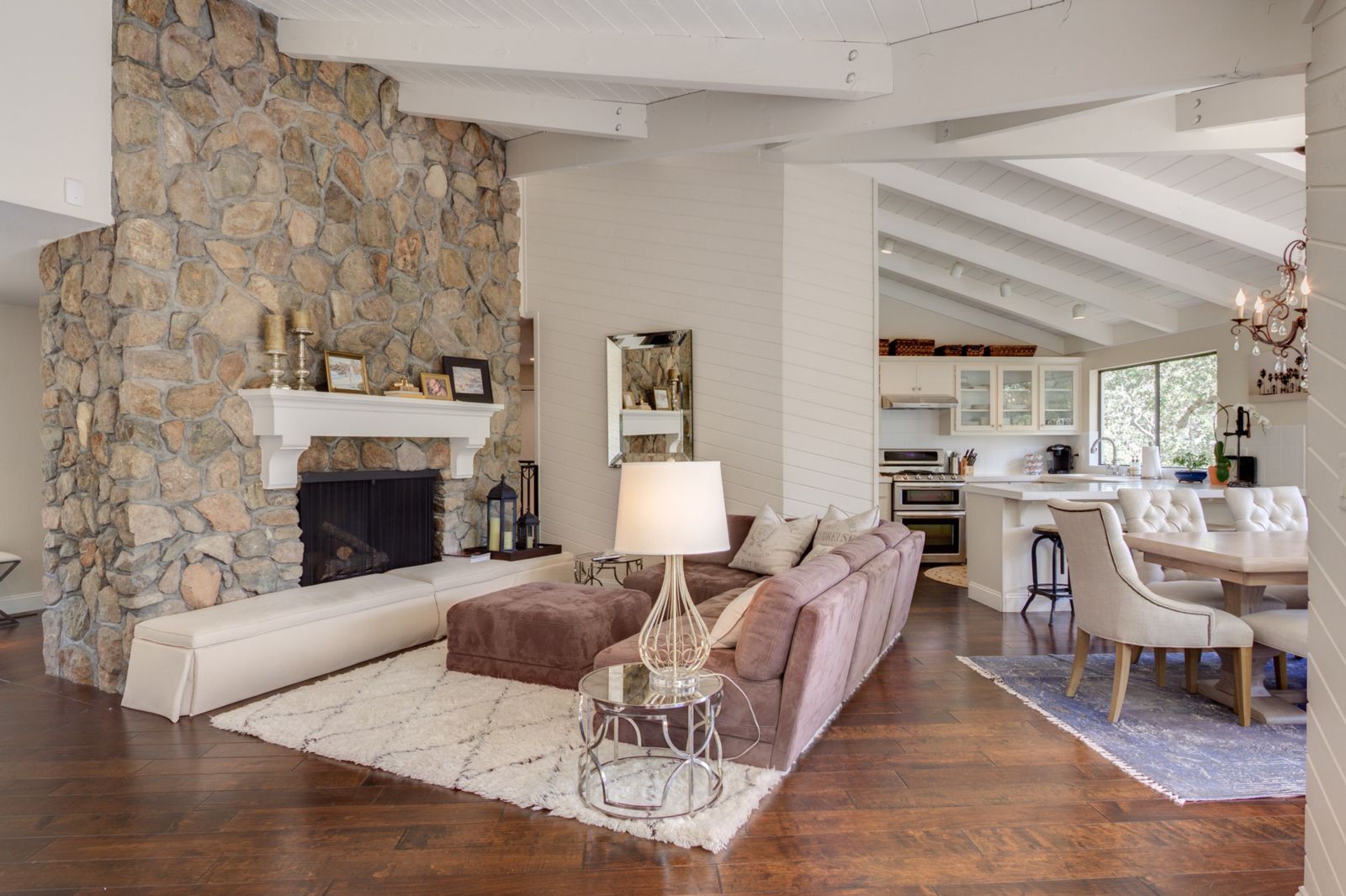 Living room with new floors, painted ceiling & custom fireplace mantle in 2014.