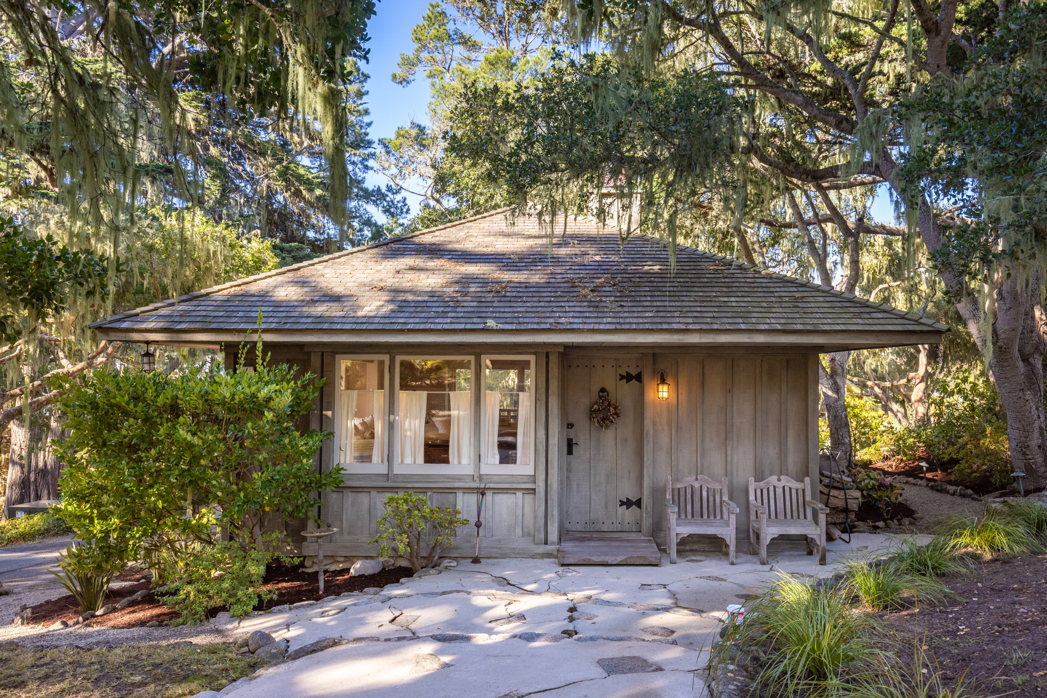 small log cabin on property